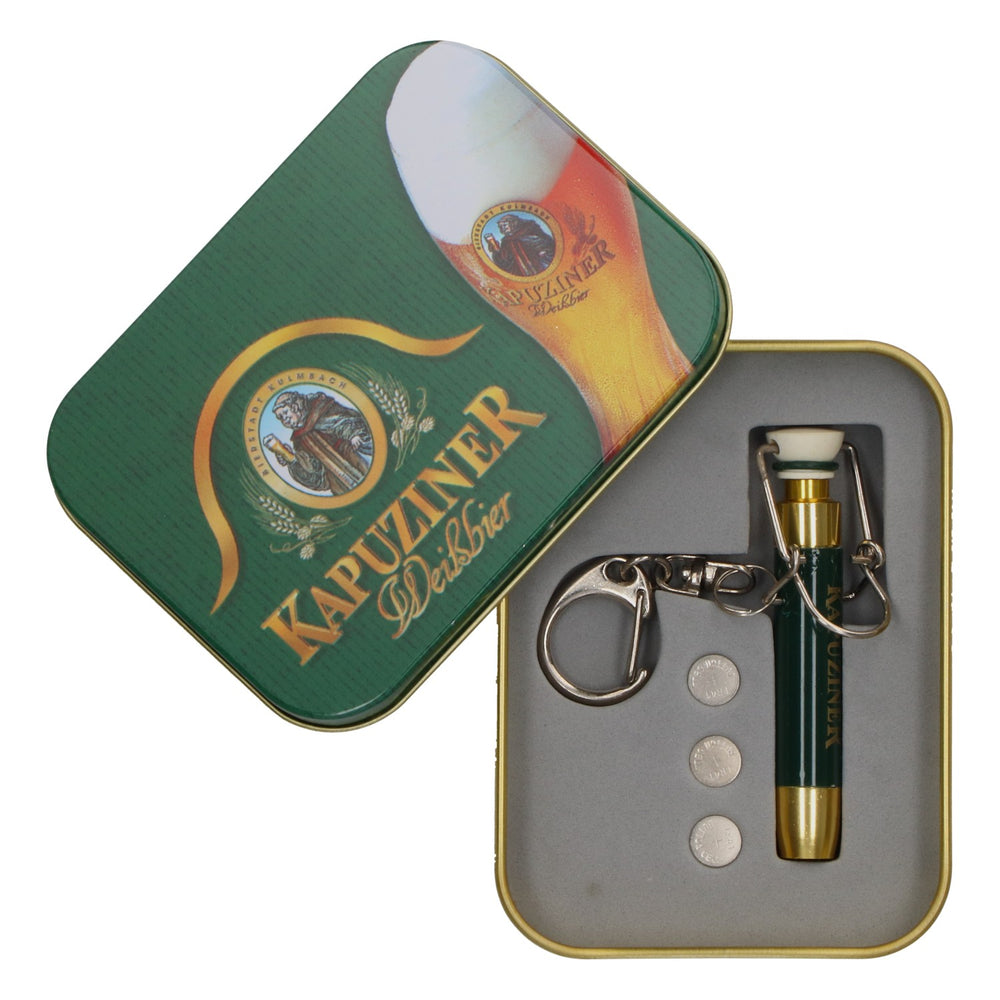 Porte-clés lampe de poche LED verte « Kapuziner » dans une boîte en fer blanc