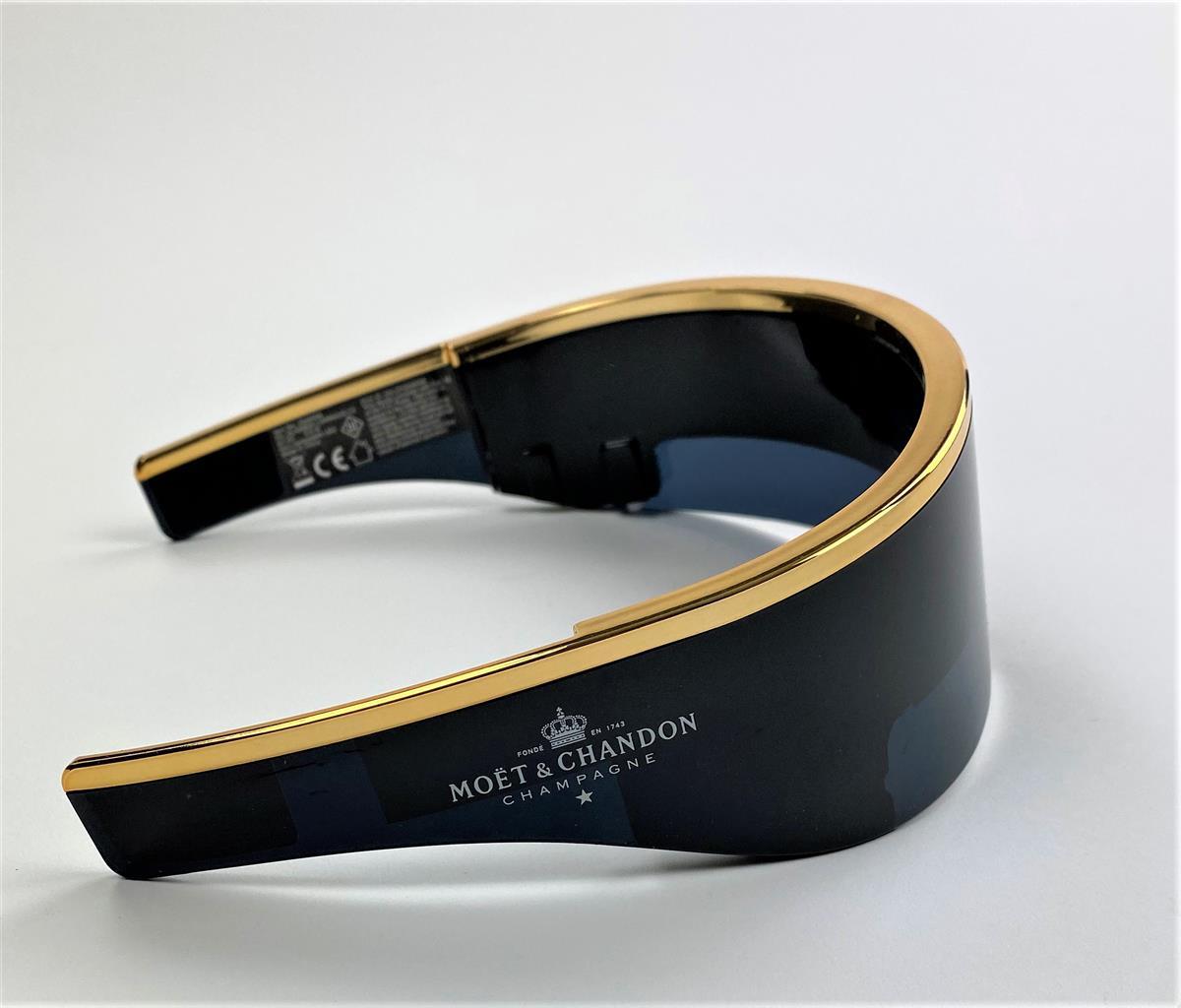 1 paire de lunettes de soleil LED Moët & Chandon avec monture dorée