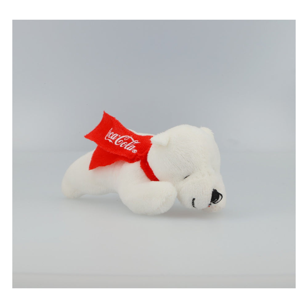 Peluche Coca-Cola « Ours polaire » en position allongée, neuve, blanche avec écharpe rouge – Objet de collection, décoration, cadeau