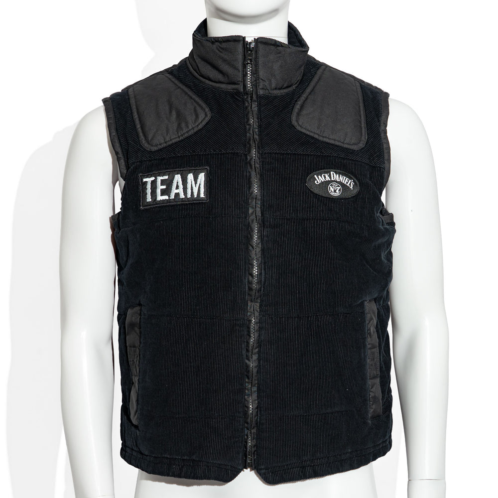 Gilet en tissu mélangé avec logo Jack Daniels en forme de poitrine sur un verre de whisky rond