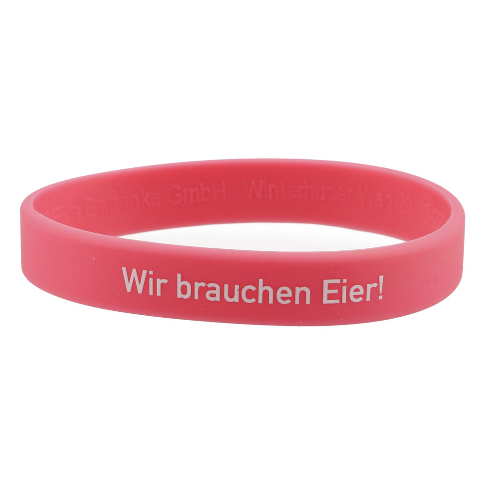 Bracelet Shatlers Bracelet d'amitié Caoutchouc rose « Wir brauchen Eier » (Nous avons besoin de couilles)